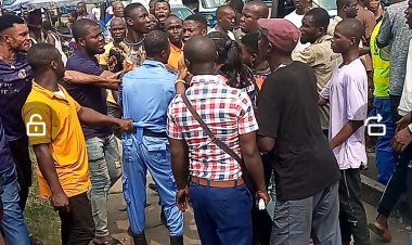Officer Dragged like a Goat as Angry Mob Joined Tricycle Operator to Fight DESTMA Officials in Delta